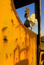AFTER 3:<br>Rooster Atop<br>Old Truck