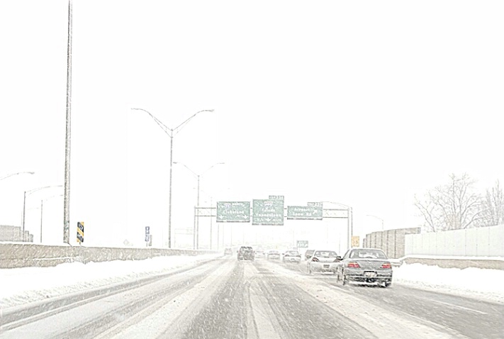 Highway Driving in Snowstorm
