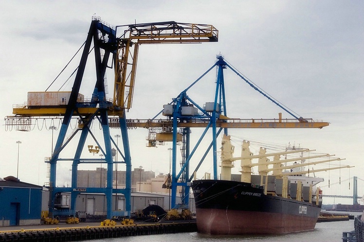 Crane Loading Cargo Freighter