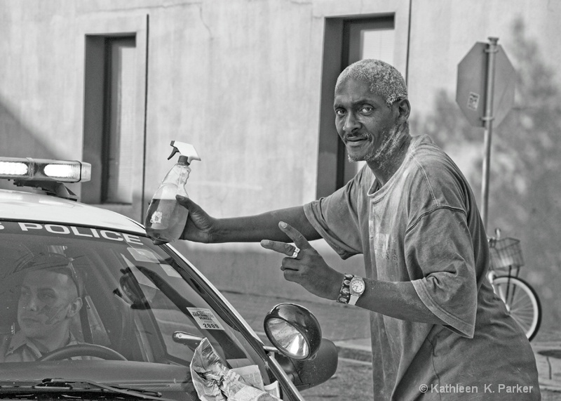 New Orleans Police Window Washer