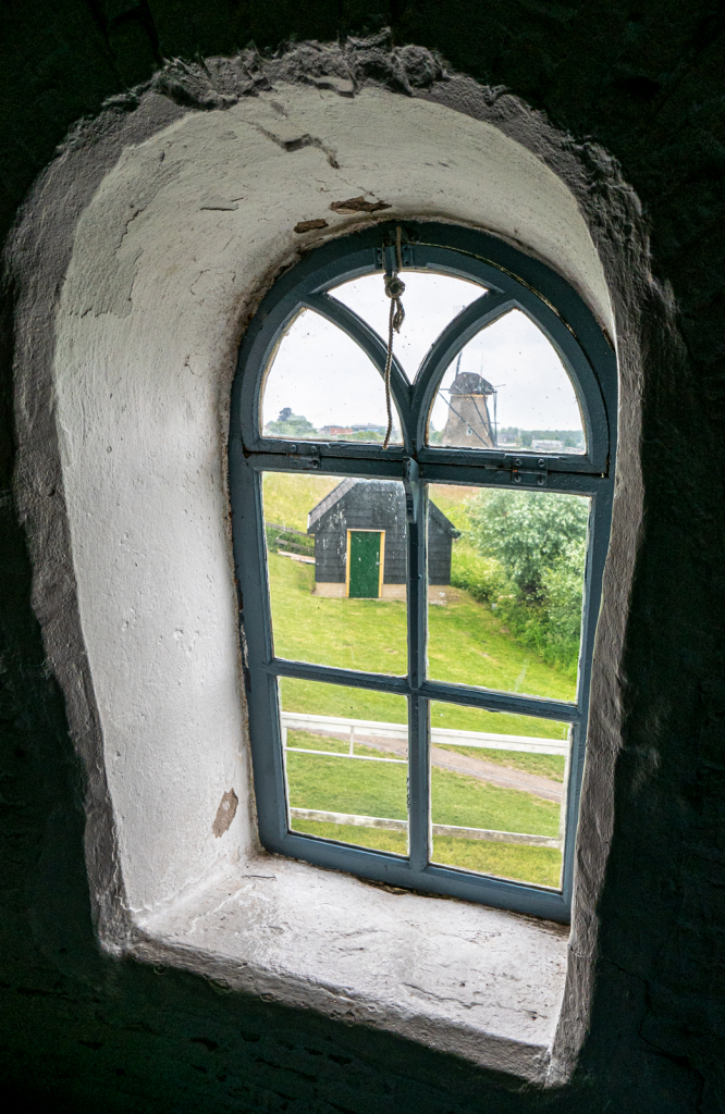 looking through a window in the mill.