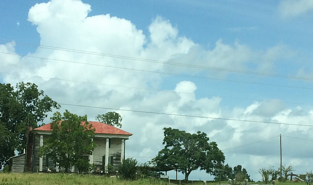 Old country home distant view