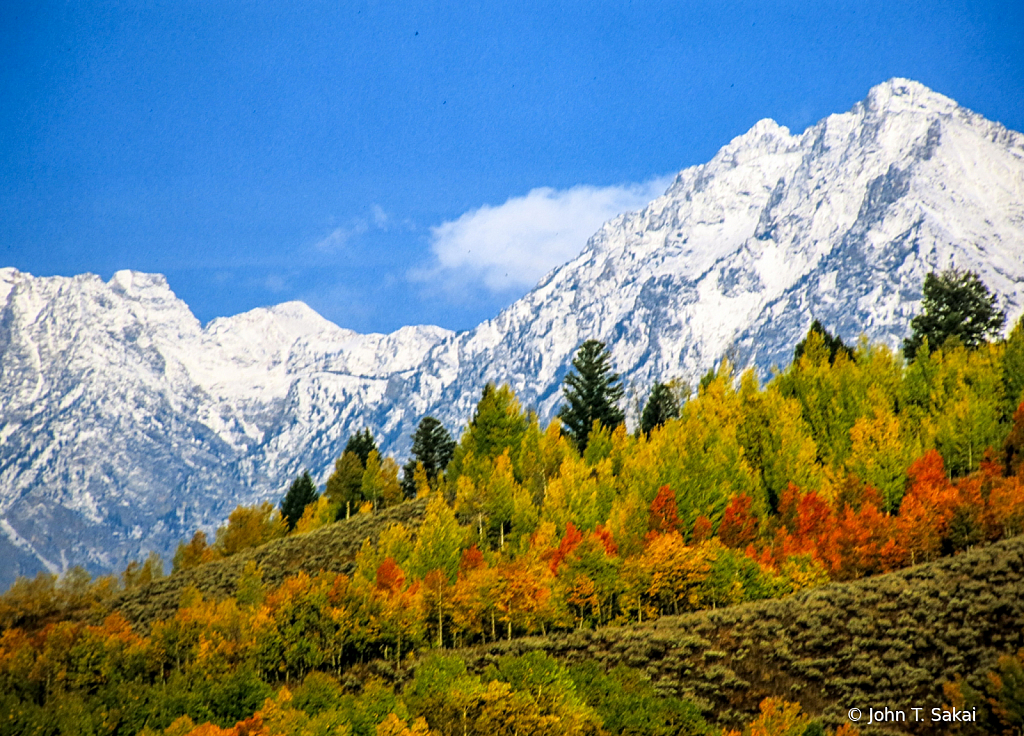 Snow-Capped Peaks in Autumn