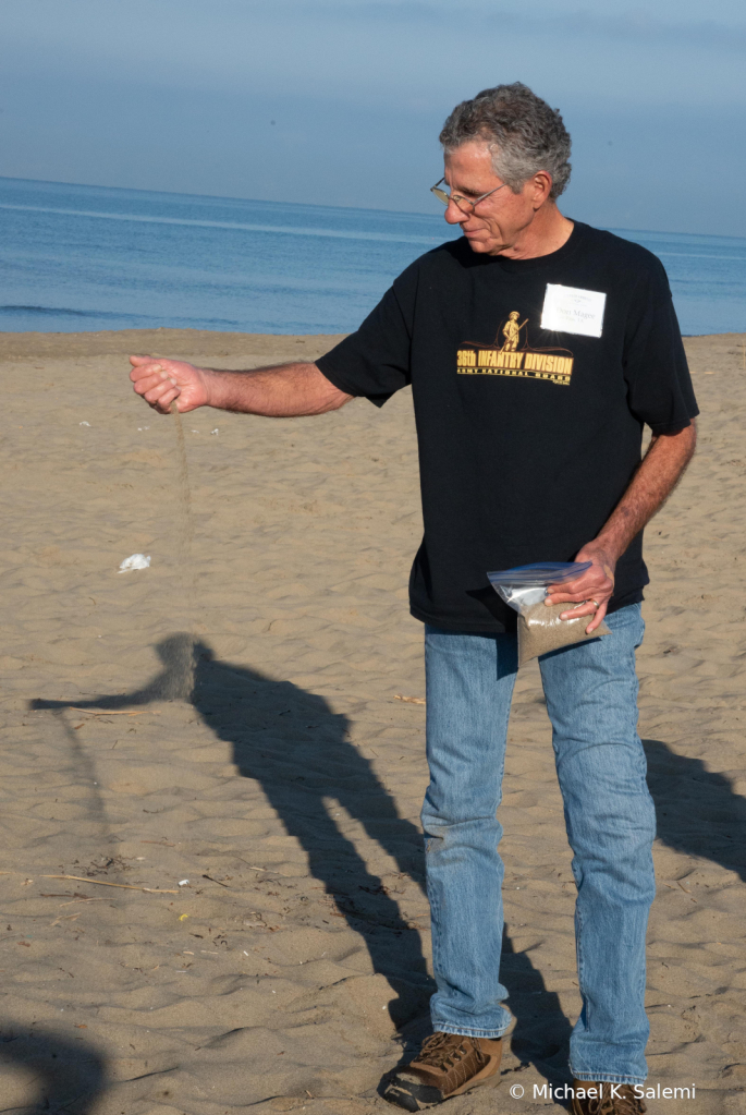 Don Magee Collects Sand from Salerno Beach