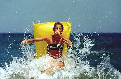 Nina riding the waves