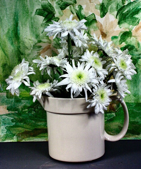 A Painting and a Jug  of Daisies