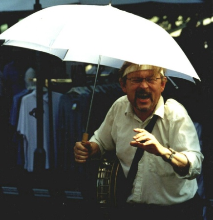 Happy man with umbrella