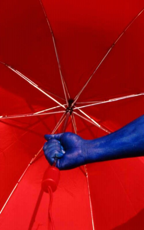 Blue Hand Holding Red Umbrella