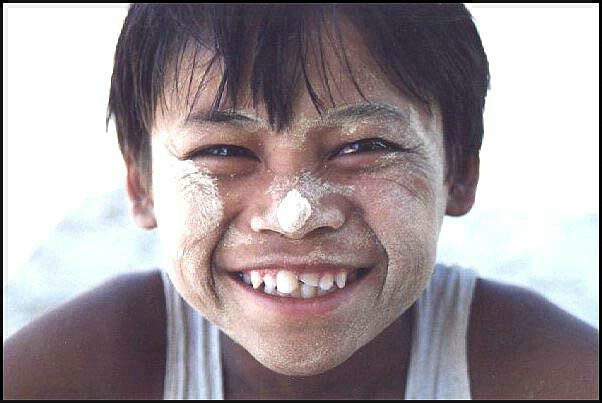 Burmese boy smeared with Thanaka paste