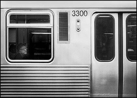 Curious Man on Red Line Train