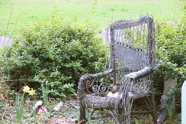 old woven chair in a garden