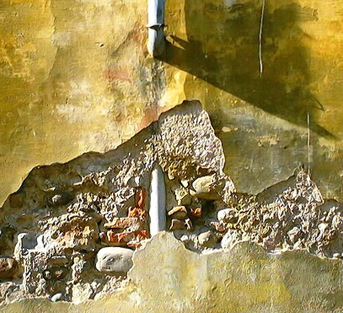 Altered bricks in the wall