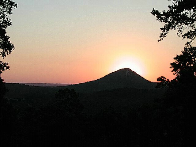 Sunrise behind Pinnacle Mountain