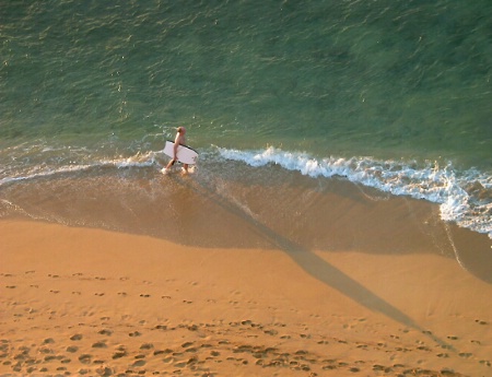 Long Shadow of a Surfer