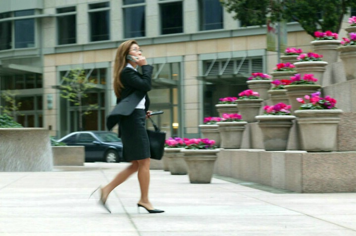 Business woman in a rush