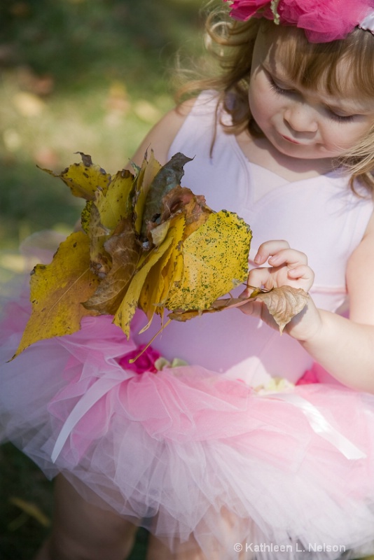 Olive Collecting Leaves in Her Tutu.