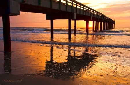 Sunrise Through the Pier