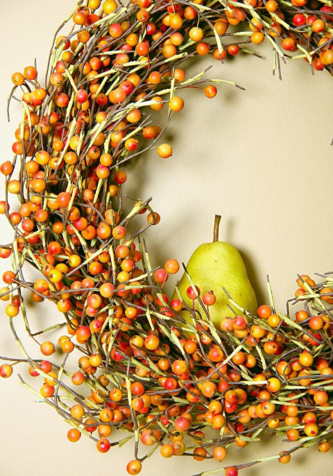 A Pear in a Berry Wreath