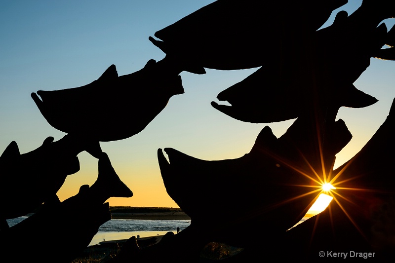 Fish Sculpture Silhouette at Sunset