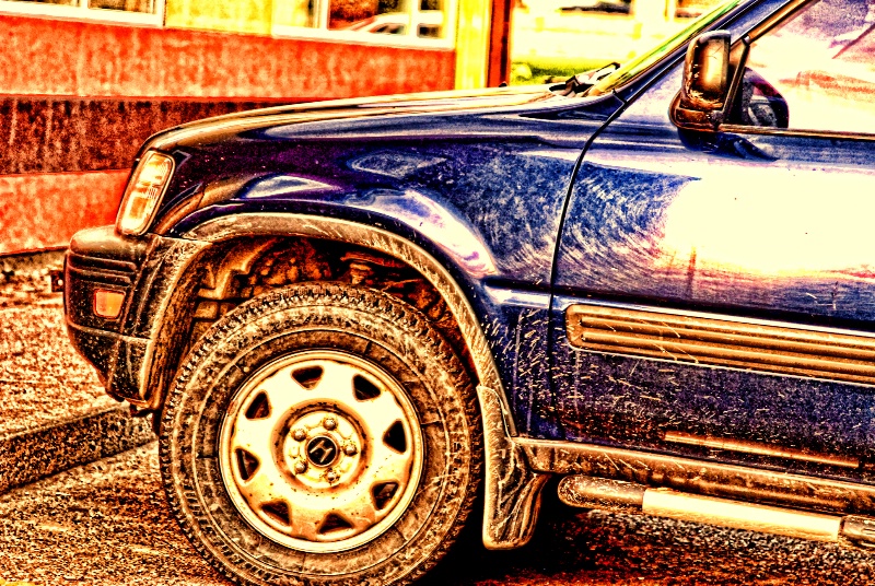  mud on blue jeep