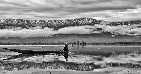 A Fisherman in Dal Lake