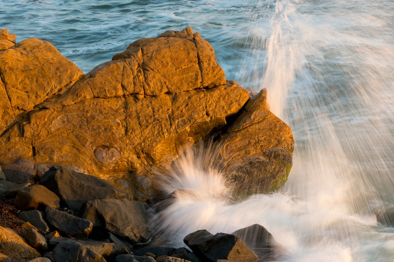 Rocks and Waves at Sunset