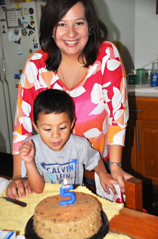 EDY WITH HIS MOM AND HIS BIRTHDAY CAKE