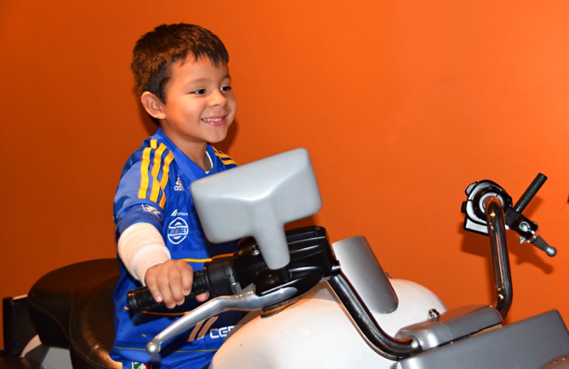 EDY  RIDING  A  MOTORCYCLE