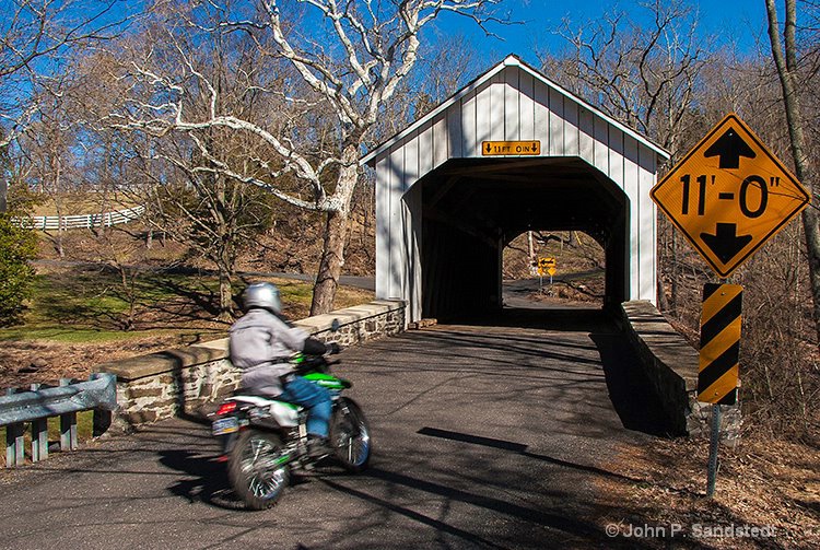 Cycling Through a Covered Bridge