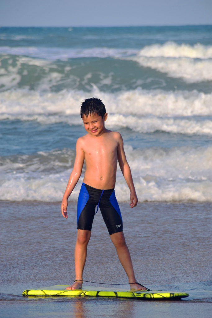 EDY  PLAYING  WITH  HIS  SWIMMING  BOARD