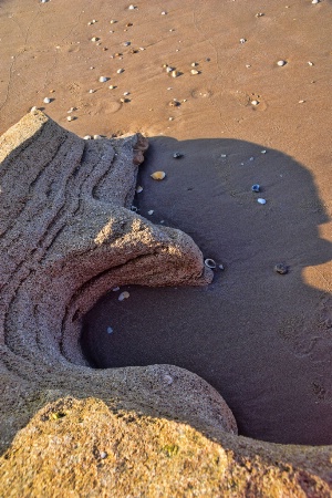 A ROCK AND ITS SHADOW
