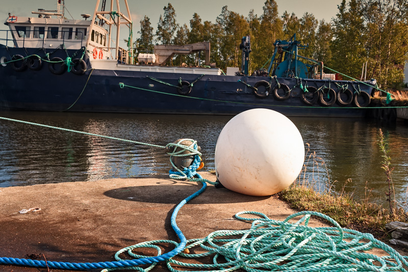 Old White Buoy On A Pier