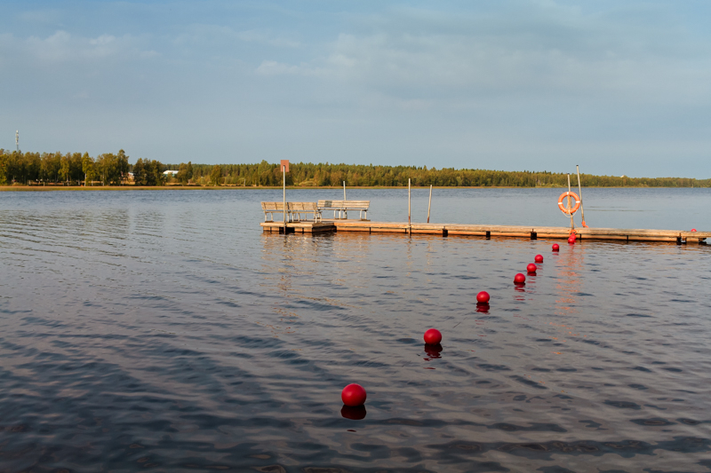 Pier And Buoys On The Lake