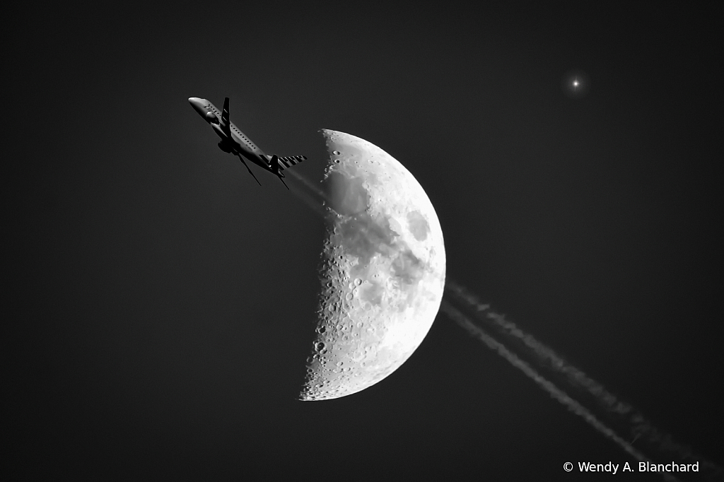 Moon and Plane with smoke trails