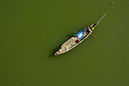 Fisher men in the river