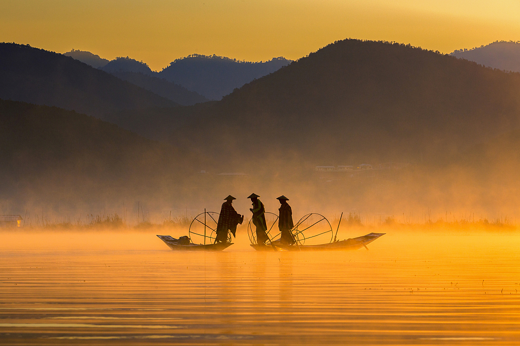 Golden morning and fishermen