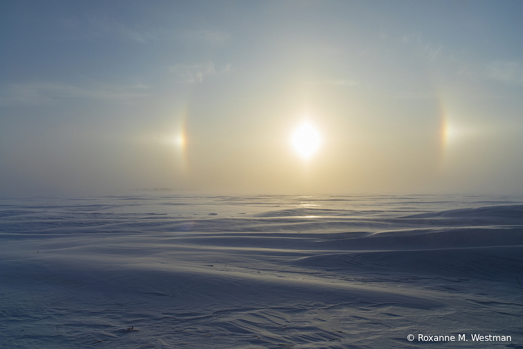 Beautiful sundogs on snowdrifts - ID: 15786354 © Roxanne M. Westman