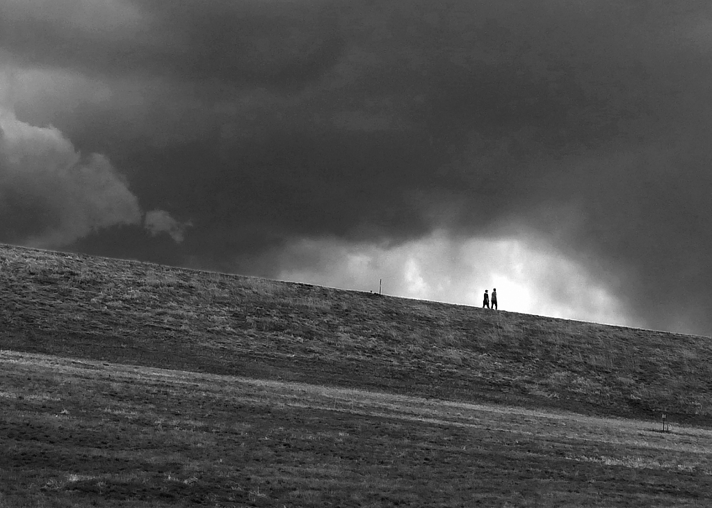 Walkers at the Top of the Dam