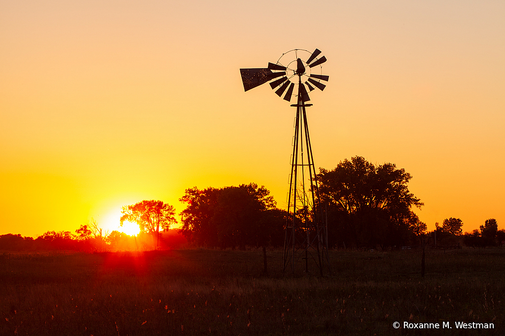 North Dakota windmill at sunset