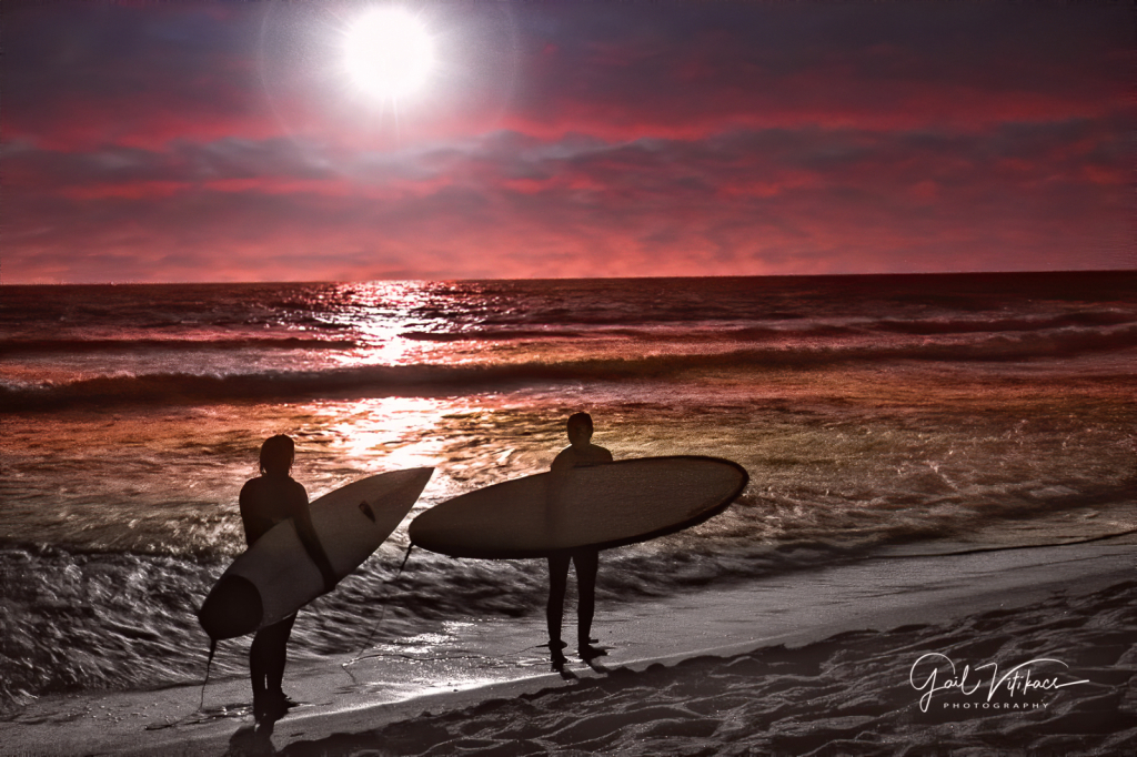 Surfers at St. Augustine Beach, FL