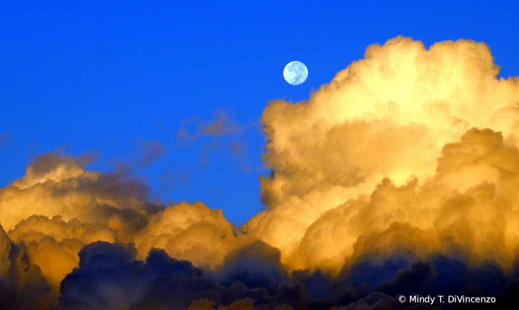 Morning Moon Above the Clouds