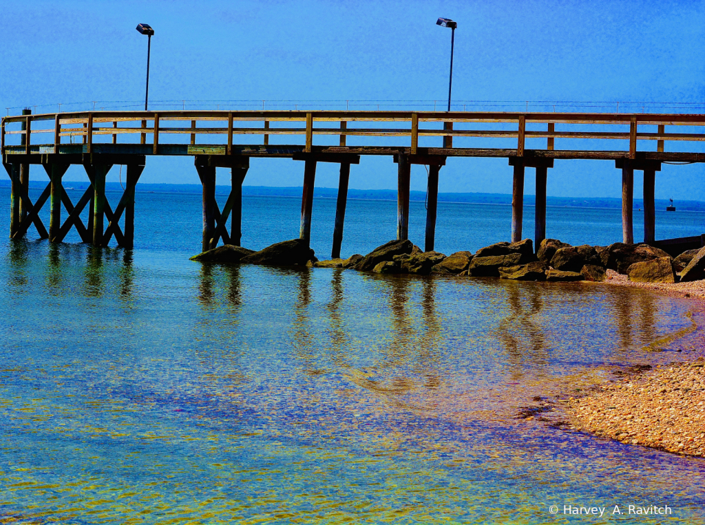 Long Pier On Colorful Beach ..