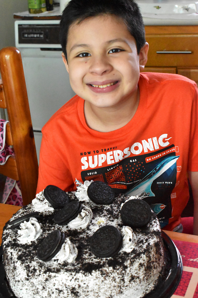 EDY WITH HIS BIRTHDAY'S CAKE