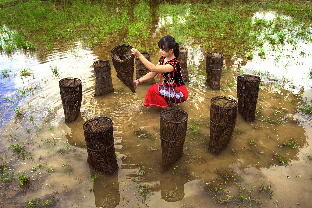 A girl preparing to go fishing