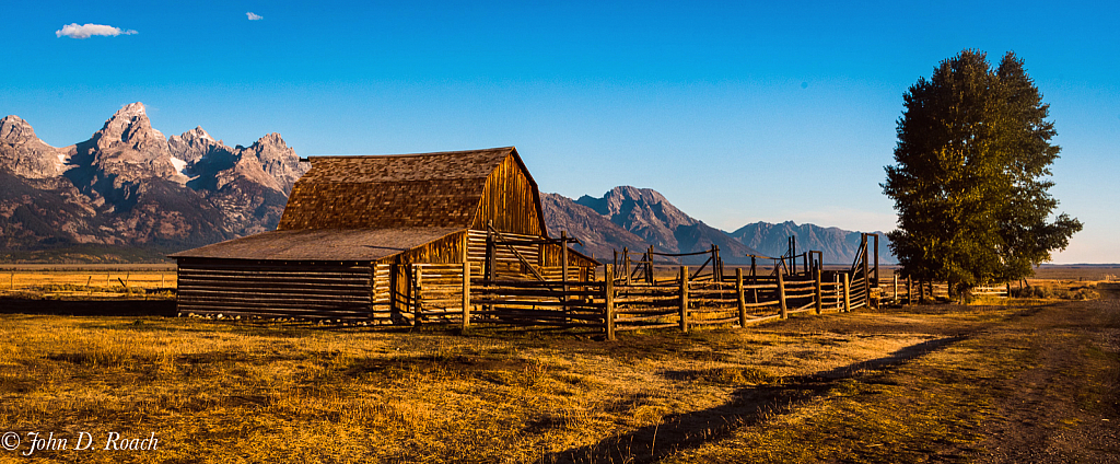 Fences, Barn, Tetons and Autumn Morning Light