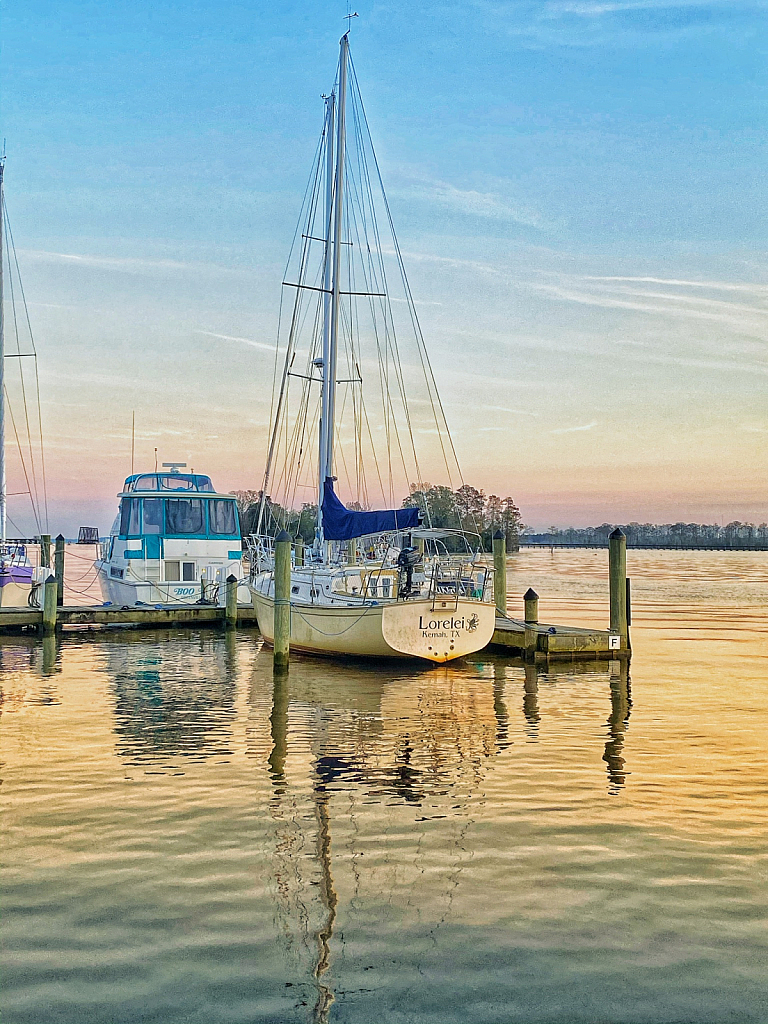 Sunset Sailboat Sitting Silently