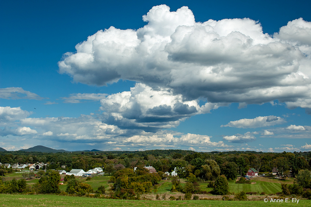 Clouds over village - ID: 15885111 © Anne E. Ely