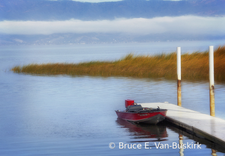 Red boat docked