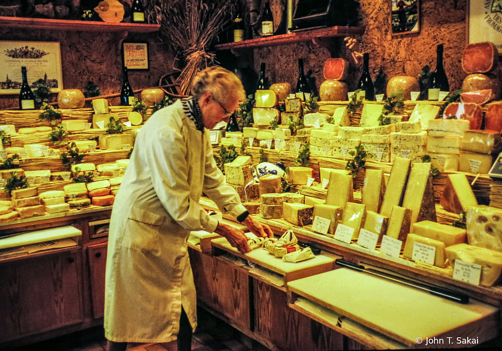 Preparing the Cheese for Sale - ID: 15927599 © John T. Sakai