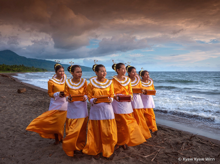 The Group of Lady with Yellow Color Dresses 